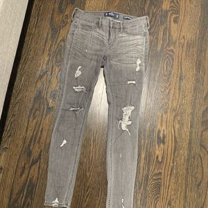 Grey distressed denim jeans